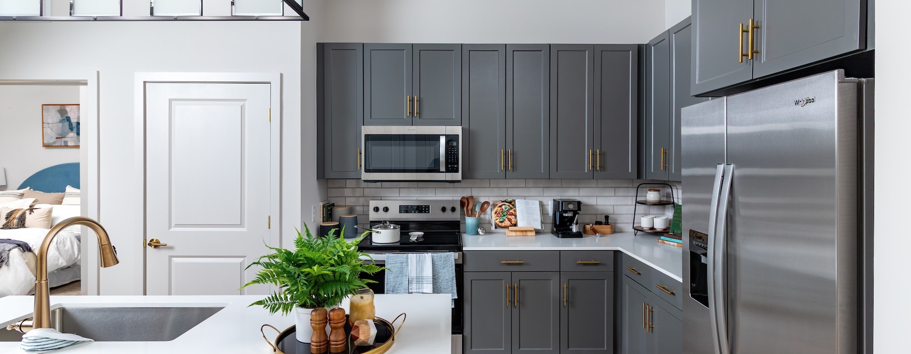 a kitchen with blue cabinets