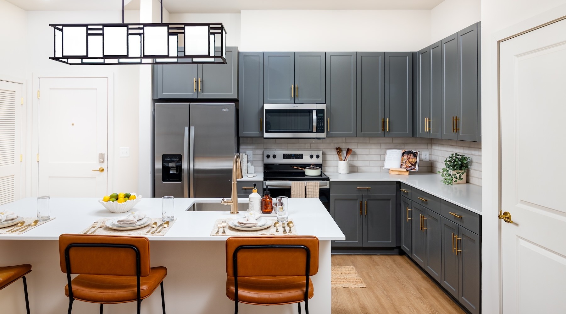 a kitchen with blue cabinets